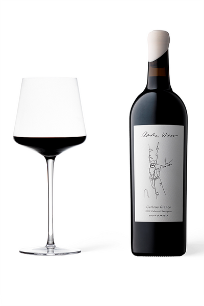 Aasha Wines - 2016 Cabernet Sauvignon - Curious Glance - wine bottle with a glass of red wine
